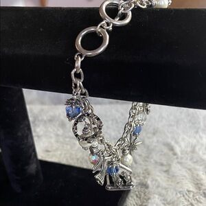 Elegant Silver Charm Bracelet with Blue Accents